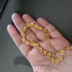 Gold plated charm flower design bracelet